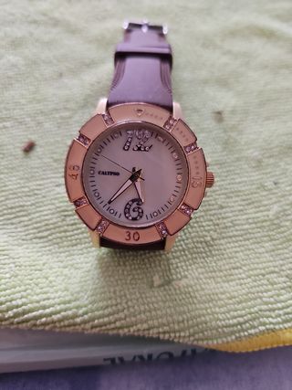 Reloj Calypso marrón dorado