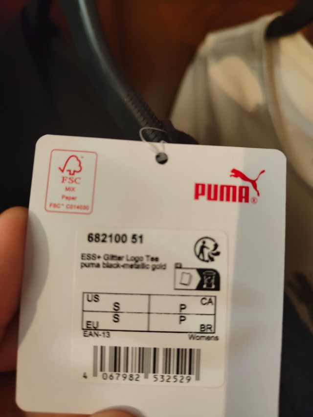 Camiseta Puma negra y dorada chica