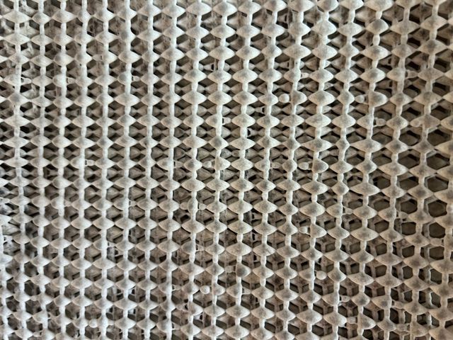 Alfombra verde y beige