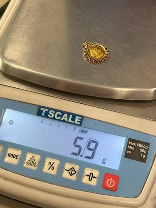 Colgante con moneda de oro 18k