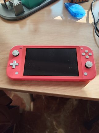 Nintendo Switch Lite Rosa, 1 Juego y cargador.