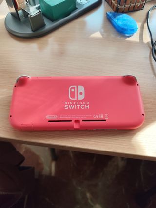 Nintendo Switch Lite Rosa, 1 Juego y cargador.