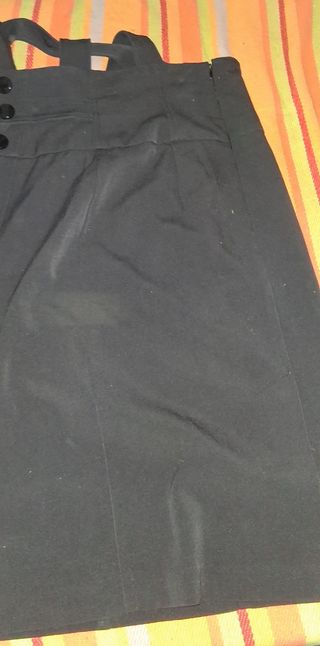 Peto negro de mujer.