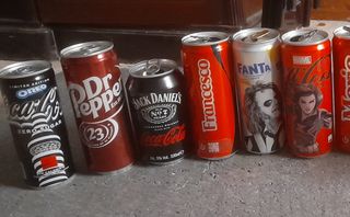 11 lattine CocaCola & Marvel