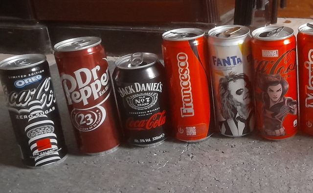 11 lattine CocaCola & Marvel