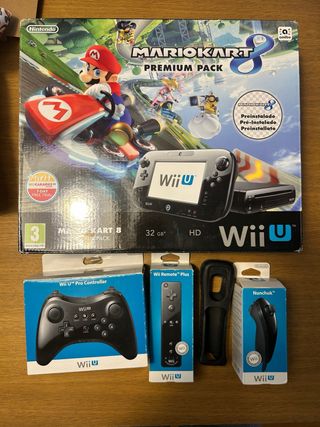 Wii U + Mario Kart 8 + 7 giochi + accessori.