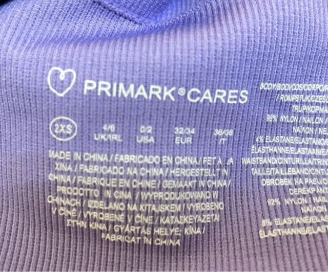 Top Primark viola a V