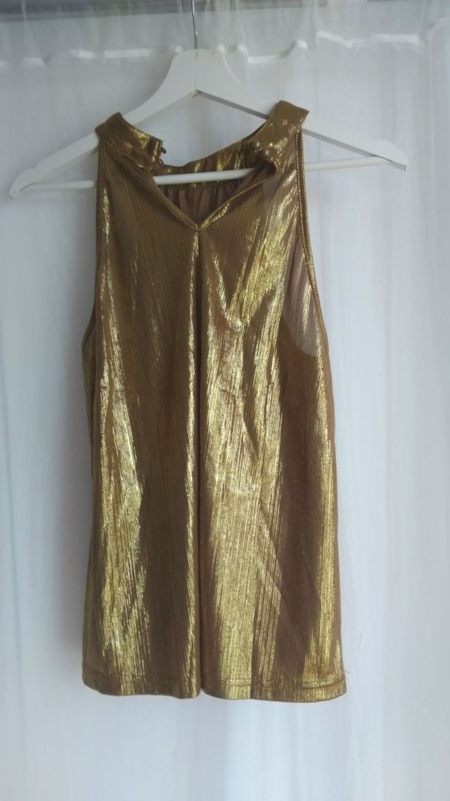 Top dorado brillante