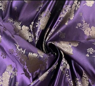 Tela fallera: morado y flores marrones. 