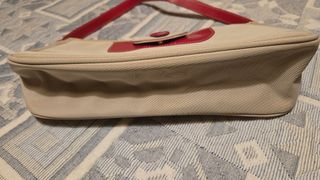 Bolsa Clarins bege e vermelha