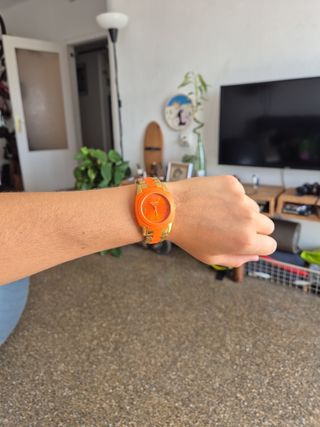 Reloj Kate Spade naranja y dorado