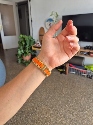 Reloj Kate Spade naranja y dorado