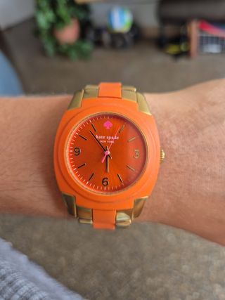 Reloj Kate Spade naranja y dorado