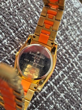 Reloj Kate Spade naranja y dorado
