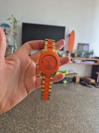 Reloj Kate Spade naranja y dorado
