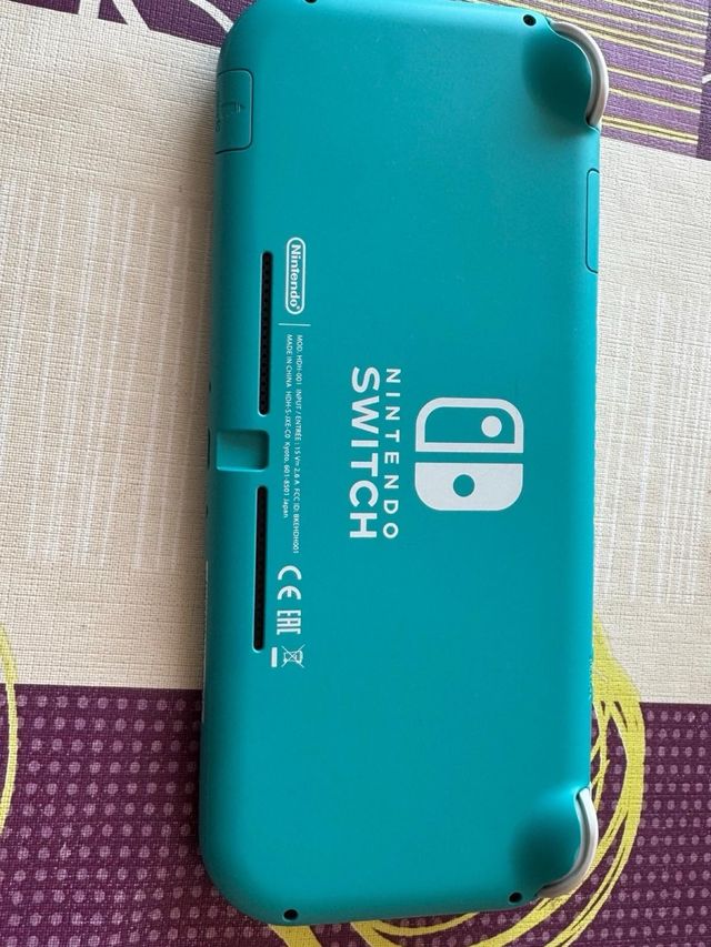 Nintendo Switch Lite turquesa + juego