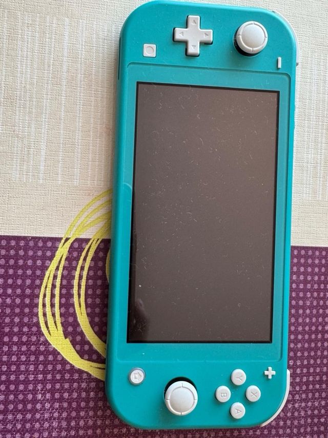 Nintendo Switch Lite turquesa + juego