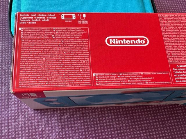 Nintendo Switch Lite turquesa + juego