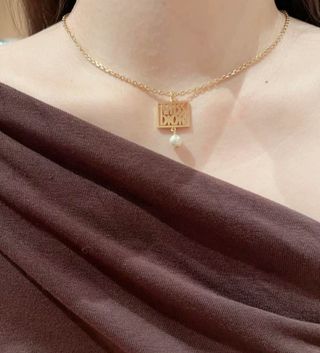 Collar Dior dorado con perla