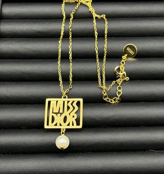 Collar Dior dorado con perla