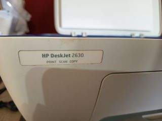 Impresora HP multifunción azul y blanca
