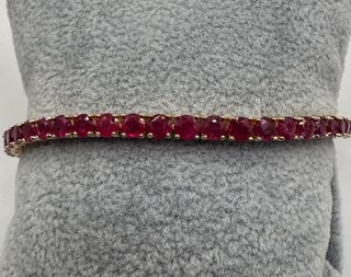 Pulsera riviere de oro 18k con rubíes