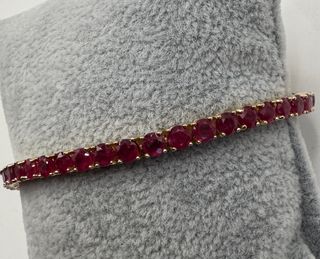 Pulsera riviere de oro 18k con rubíes