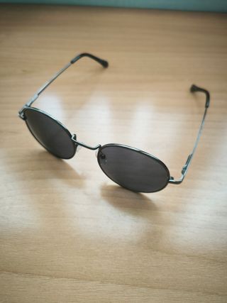Gafas sol redondas negras