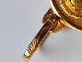 Cadena con medalla de oro 18 kt