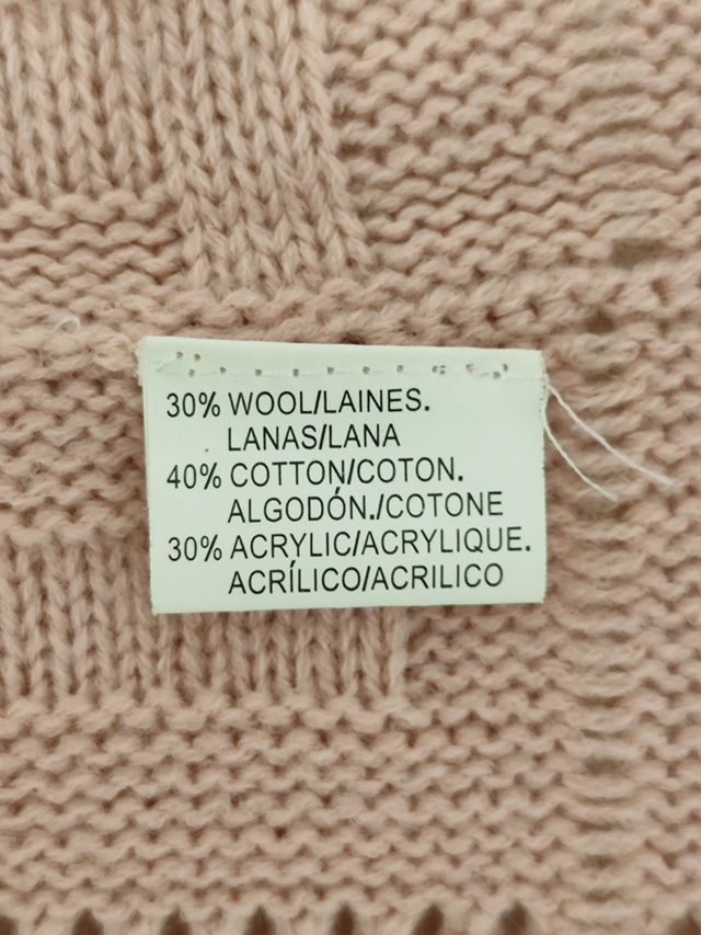 Poncho rosa con frange