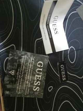 Reloj Guess dorado y plateado