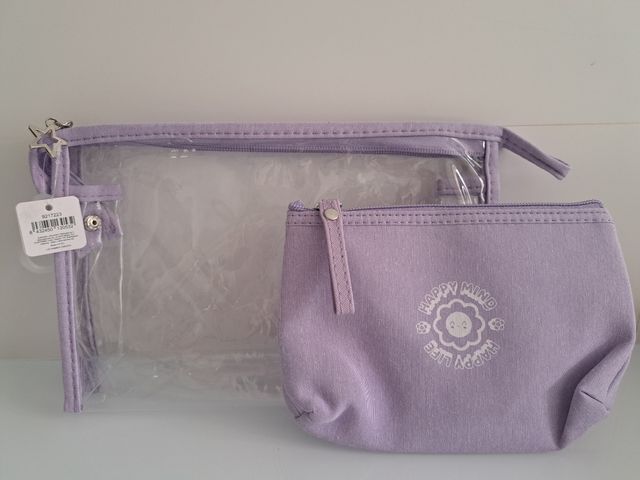 2 neceseres morado, nuevos!