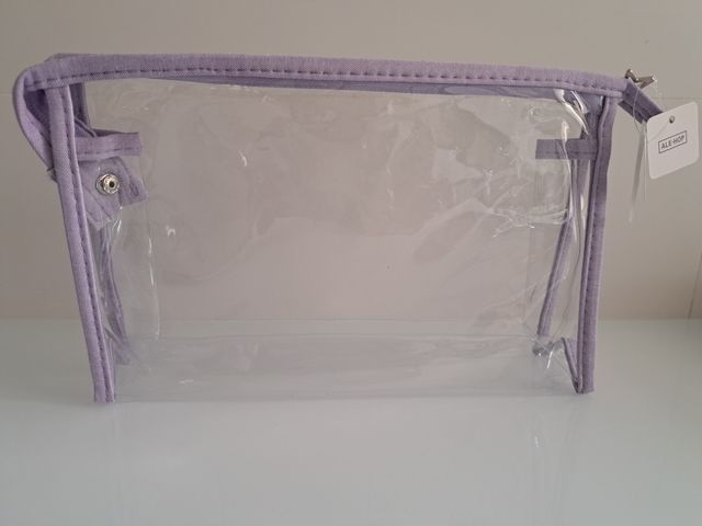 2 neceseres morado, nuevos!