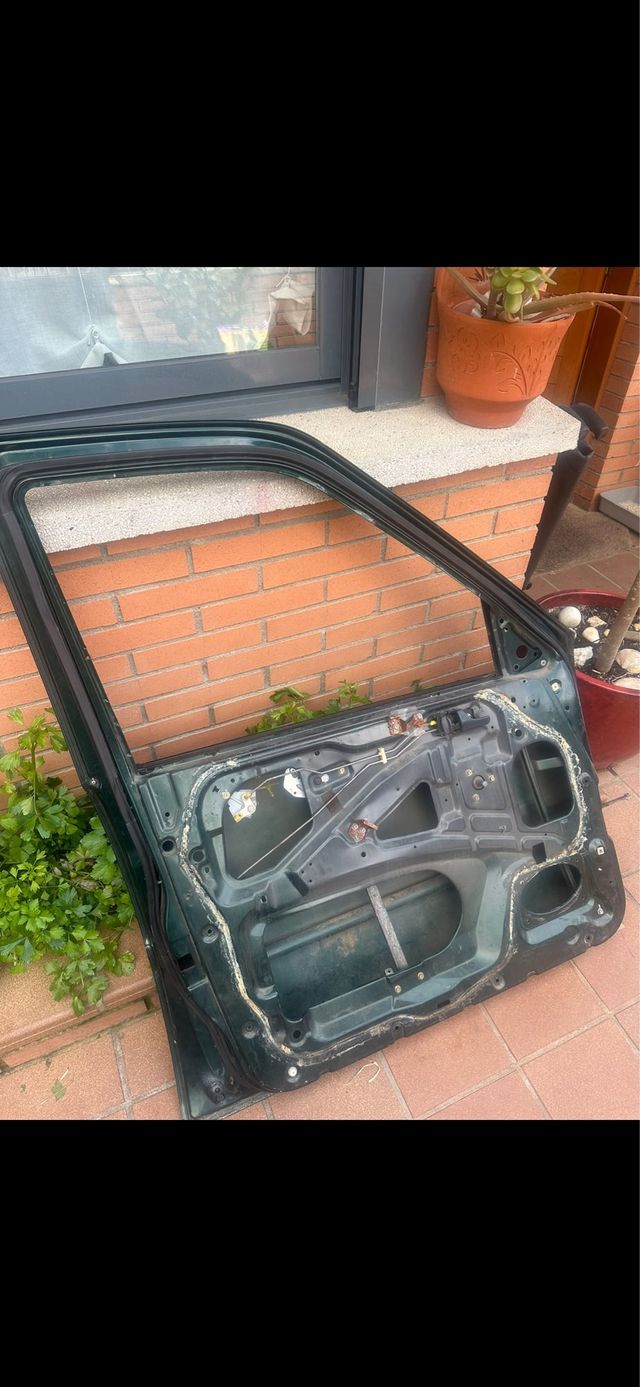 Puerta Nissan Terrano II delantera Izquierda