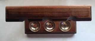 Supporto per 3 pipe in legno intagliato