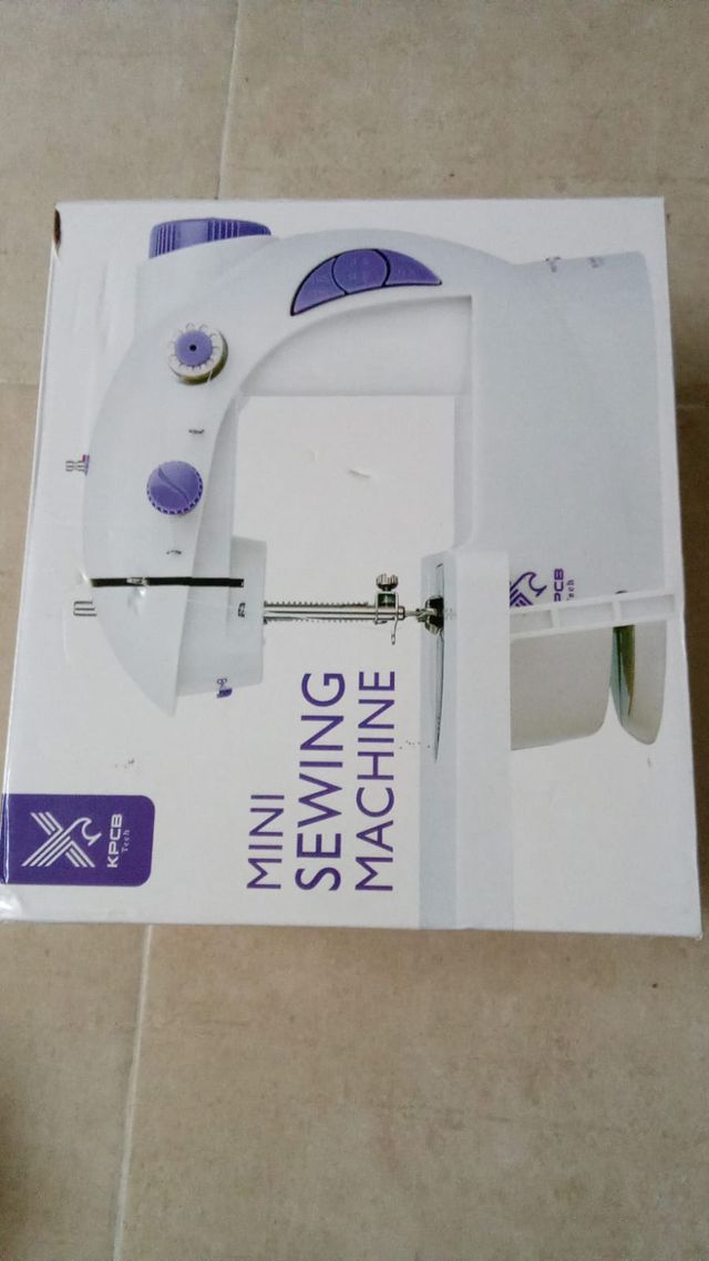 Mini máquina de coser