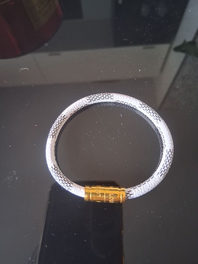 Pulsera Louis Vuitton - Blanca y dorada