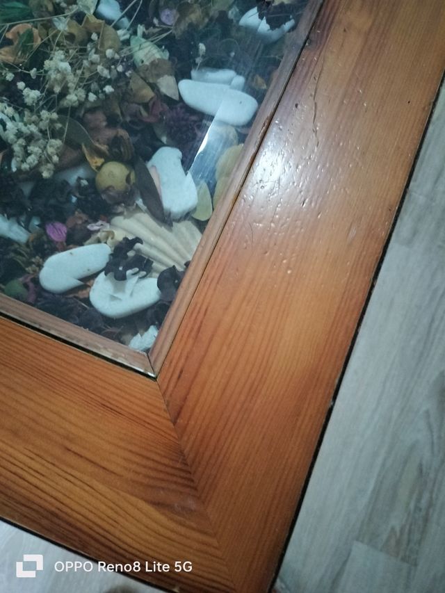 Mesa centro de madeira com 4 gavetas com rodas