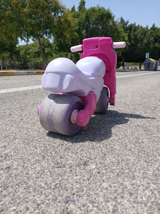 Moto rosa juguete niña