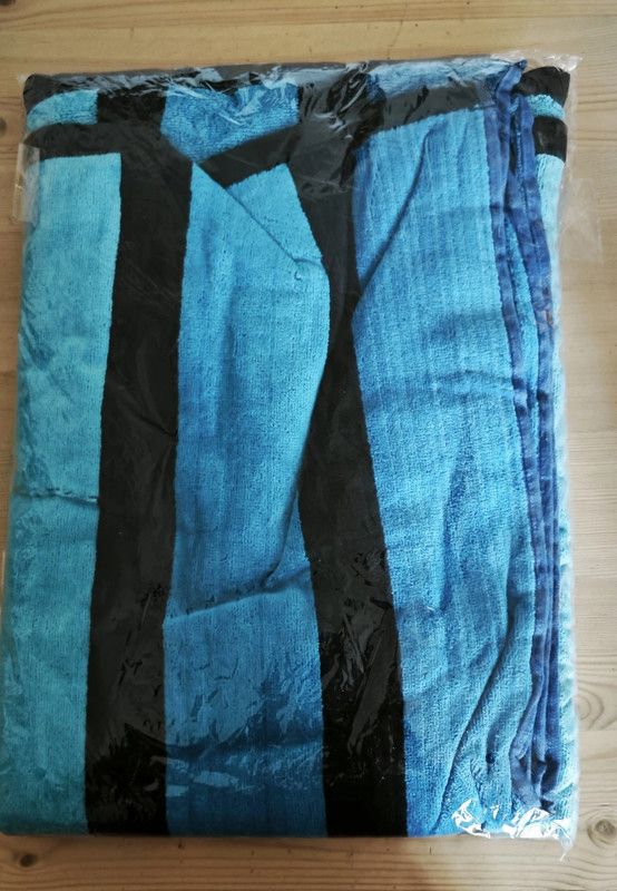 Toalla playa rayas azul turquesa