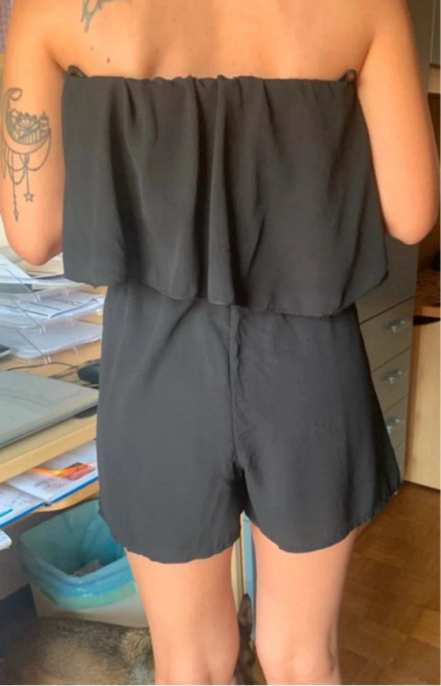 Tutina nera scollo a barca