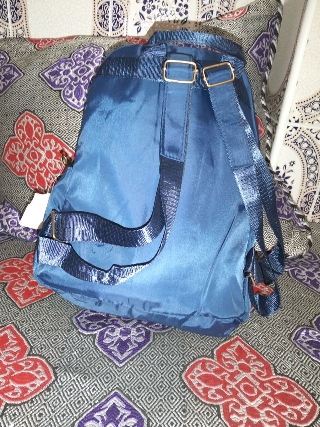 Mochila azul nueva + neceser y riñonera a juego