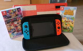 Nintendo Switch + Mario Kart 8 Deluxe + Animal Cro