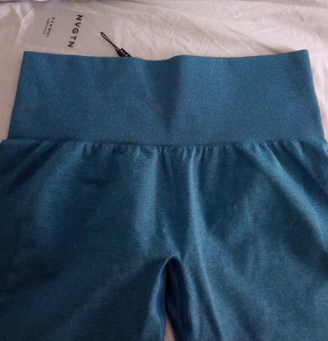 Shorts deportivos NVGTN XS - Teal con etiqueta