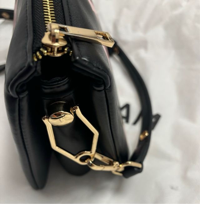 Bolso negro estrellas