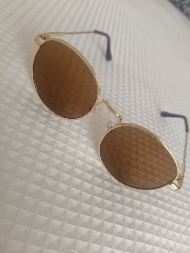 Gafas redondas doradas