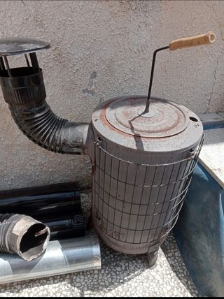 Estufa leña redonda antigua