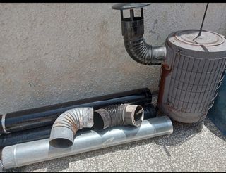 Estufa leña redonda antigua