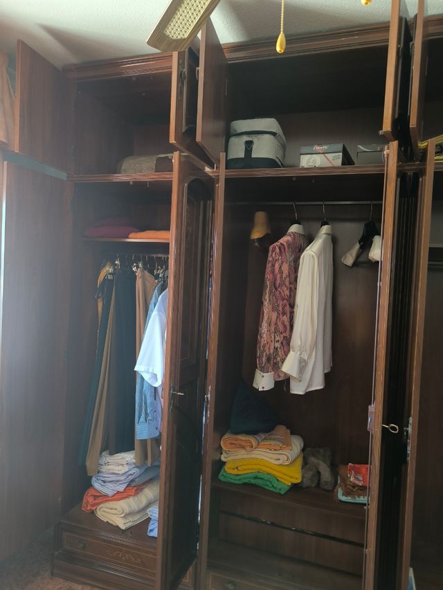 Dormitorio clásico madera