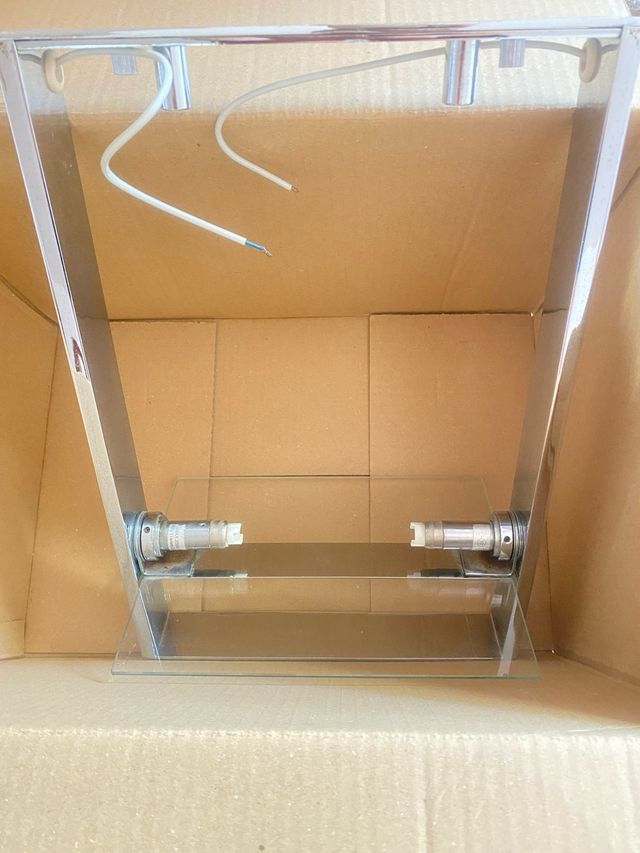 Lampada da tetto moderna - acciaio e cristallo.